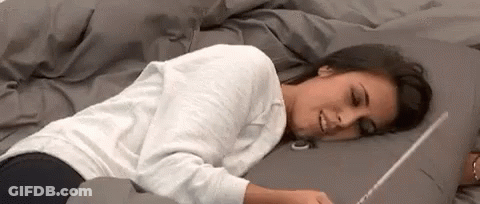 Bald Man Kneeling In Front Of LH Sign GIF