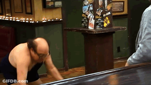 Bald Man Kneeling In Front Of Table Saying A Few GIF
