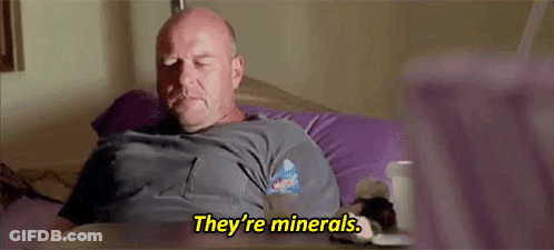 Bald Man Laying On Bed Says They're Minerals GIF