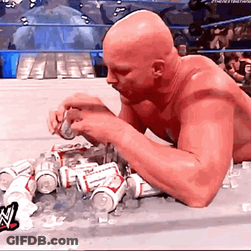 Bald Man Laying On Floor Eating Budweiser GIF