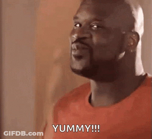 Bald Man Making Funny Face Saying Yummy GIF