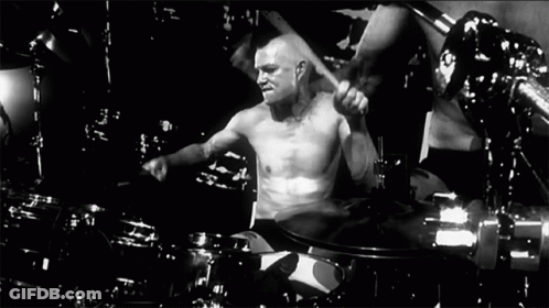 Bald Man Playing Drums GIF