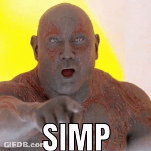Bald Man Pointing At Camera With Word Simp GIF