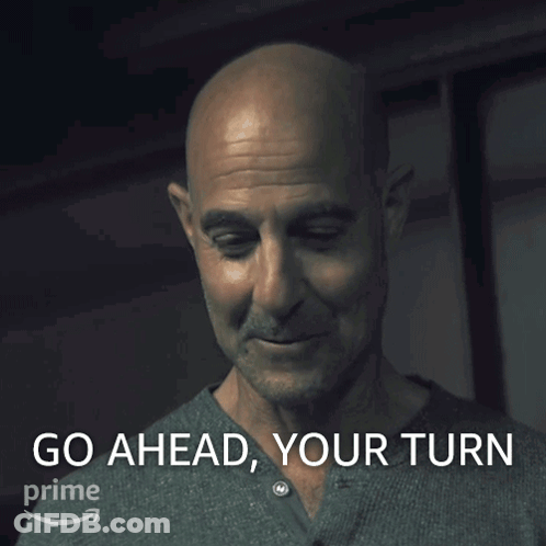 Bald Man Saying Go Ahead Your Turn In Front Of Amazon Logo GIF