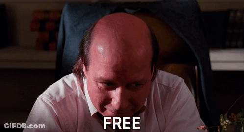 Bald Man Sitting At Desk Saying Free GIF