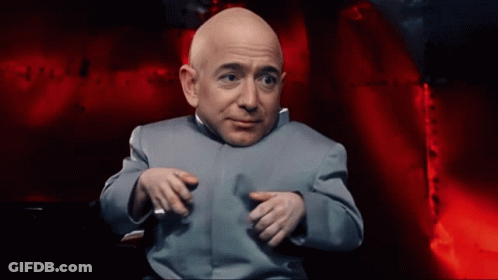 Bald Man Sitting Gray Suit Red Background GIF