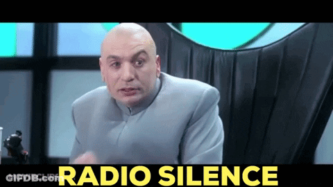 Bald Man Sitting In Chair Saying Radio Silence GIF
