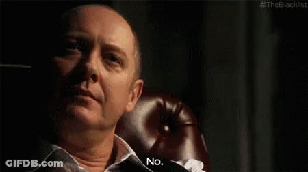 Bald Man Sitting In Red Leather Chair Saying No GIF
