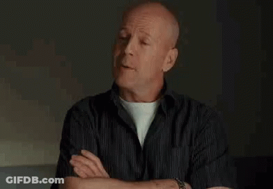 Bald Man Smiling At Watch GIF