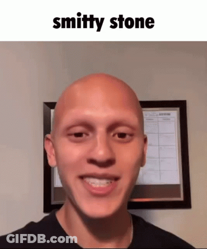 Bald Man Smiling In Front Of Calendar Saying Smithy Stone GIF