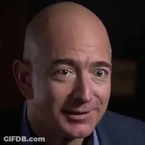 Bald Man Smiling In Suit GIF