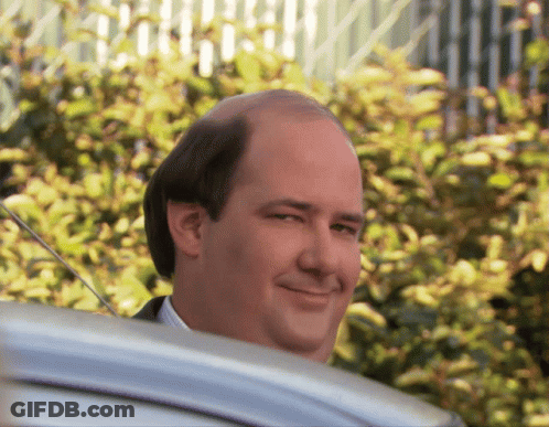 Bald Man Smiling Out Car Window GIF