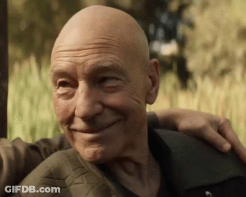 Bald Man Smiling With Arm Around Another Man GIF