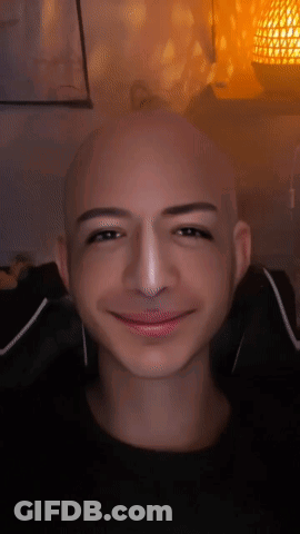 Bald Man Smiling With Nose Ring GIF