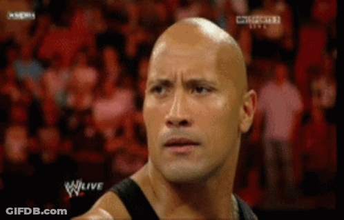 Bald Man Standing In Crowd GIF