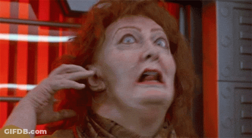 Bald Man Surprised Face Red Curtain GIF