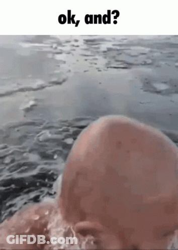 Bald Man Swimming With Ok And ? Above GIF