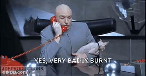 Bald Man Talking On Red Telephone Holding Cat GIF