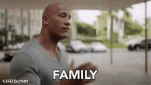 Bald Man Talking To Someone Saying Family GIF