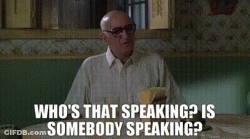 Bald Man Wearing Glasses Asking Who's That Speaking GIF