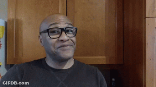 Bald Man Wearing Glasses Smiling GIF