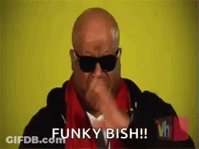 Bald Man Wearing Sunglasses And Red Scarf Making Funny Face GIF