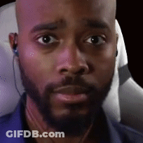 Bald Man With Beard And Earbuds GIF