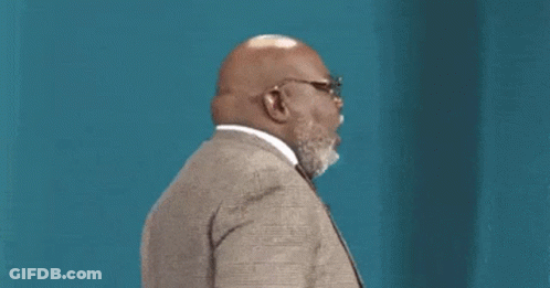 Bald Man With Beard And Glasses In Suit And Tie GIF