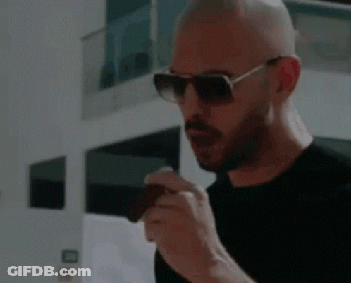 Bald Man With Beard And Sunglasses In Black Shirt GIF