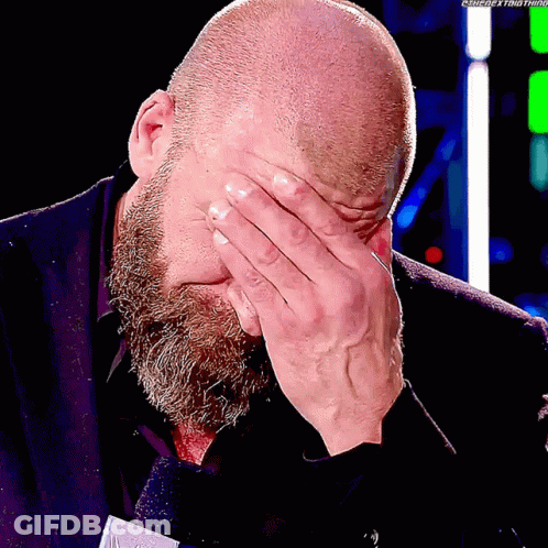 Bald Man With Beard Covering Face GIF