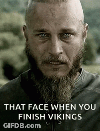 Bald Man With Beard, Forehead Tattoo Beside Pole GIF