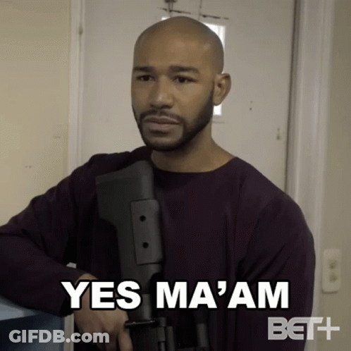 Bald Man With Beard Holding Gun GIF