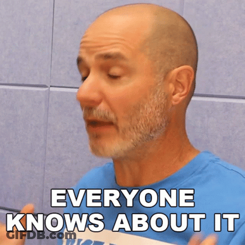 Bald Man With Beard In Blue Shirt Saying Everyone Knows About It GIF