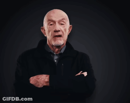 Bald Man With Beard In Front Of I'm Mike Sign GIF