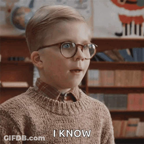 Bald Man With Beard In Front Of WWE Logo GIF