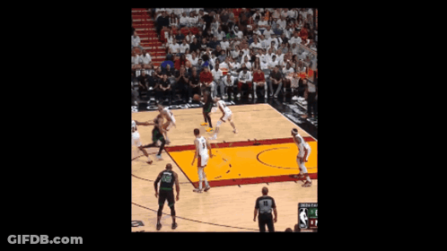 Bald Man With Beard In Green Jersey Smiling In Crowd GIF