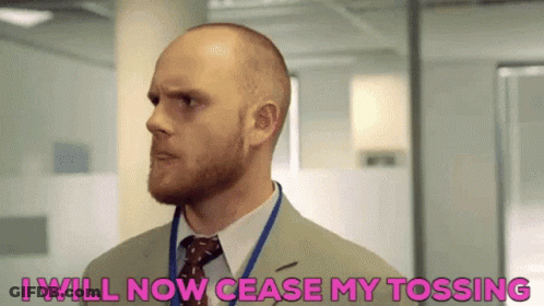 Bald Man With Beard In Suit Saying I Will Now Cease My Tossing GIF
