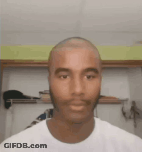 Bald Man With Beard In White Shirt GIF