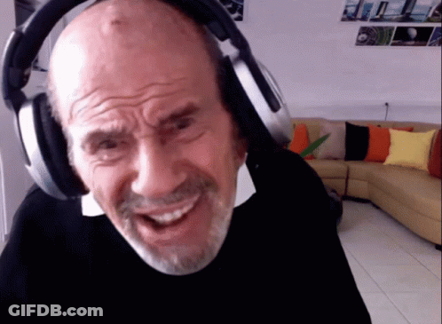 Bald Man With Beard Smiling In Headphones GIF