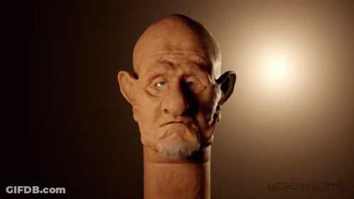 Bald Man With Beard Statue Saying Noiseeffectoiitic GIF