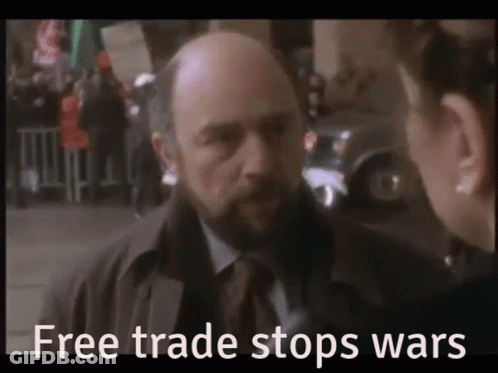 Bald Man With Beard Talking To Woman Free Trade Stops Wars GIF