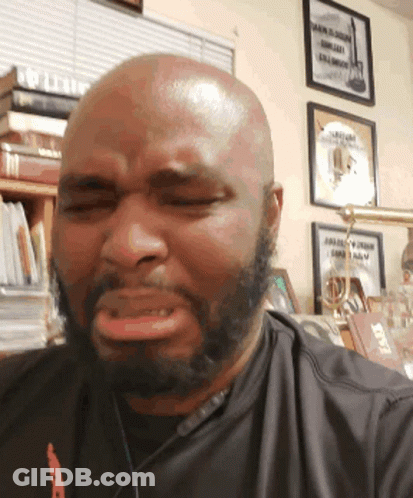 Bald Man With Beard Wearing Black T-Shirt GIF