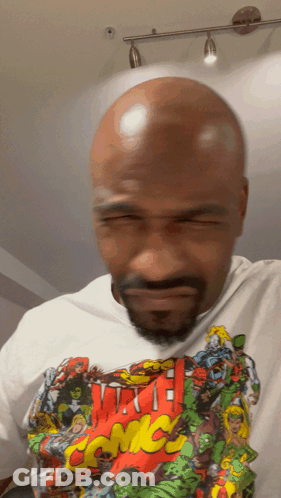 Bald Man With Beard Wearing Marvel T-Shirt GIF