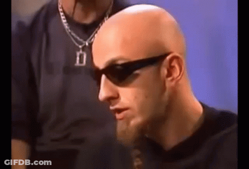 Bald Man With Beard Wearing Sunglasses And Necklace GIF