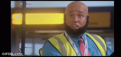 Bald Man With Beard Wearing Yellow Vest And TV Lanyard GIF