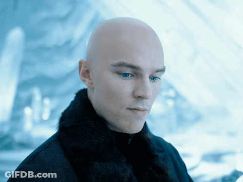 Bald Man With Blue Eyes In Black Coat GIF