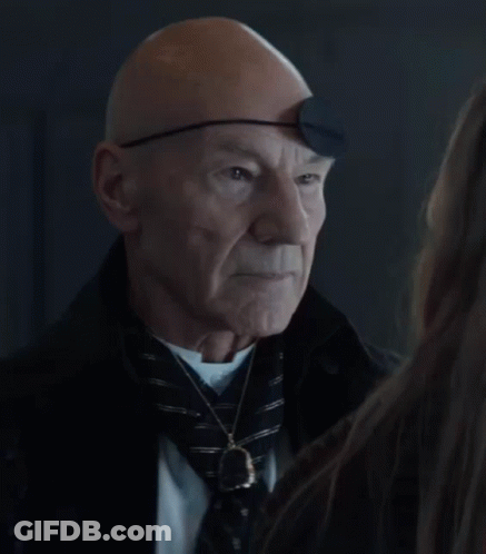 Bald Man With Eye Patch Looking At Woman Saying Yes GIF