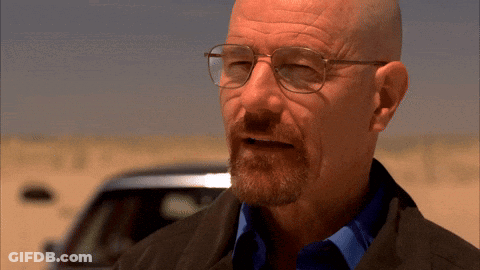 Bald Man With Glasses And Beard In Desert GIF