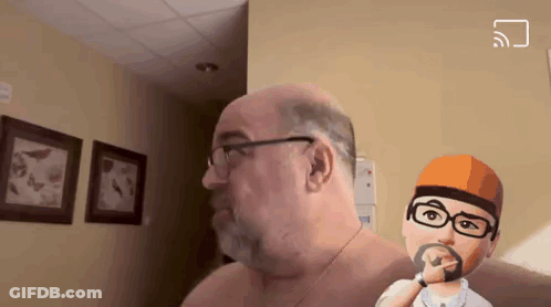 Bald Man With Glasses And Beard Next To Cartoon Man GIF