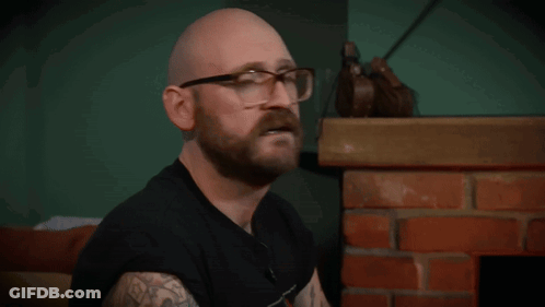 Bald Man With Glasses And Beard Says D GIF